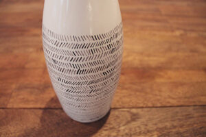 making this: DIY perrier bottle turned vase