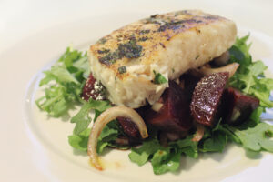 eating this: sauteed halibut with arugula, beets and horseradish crème fraîche