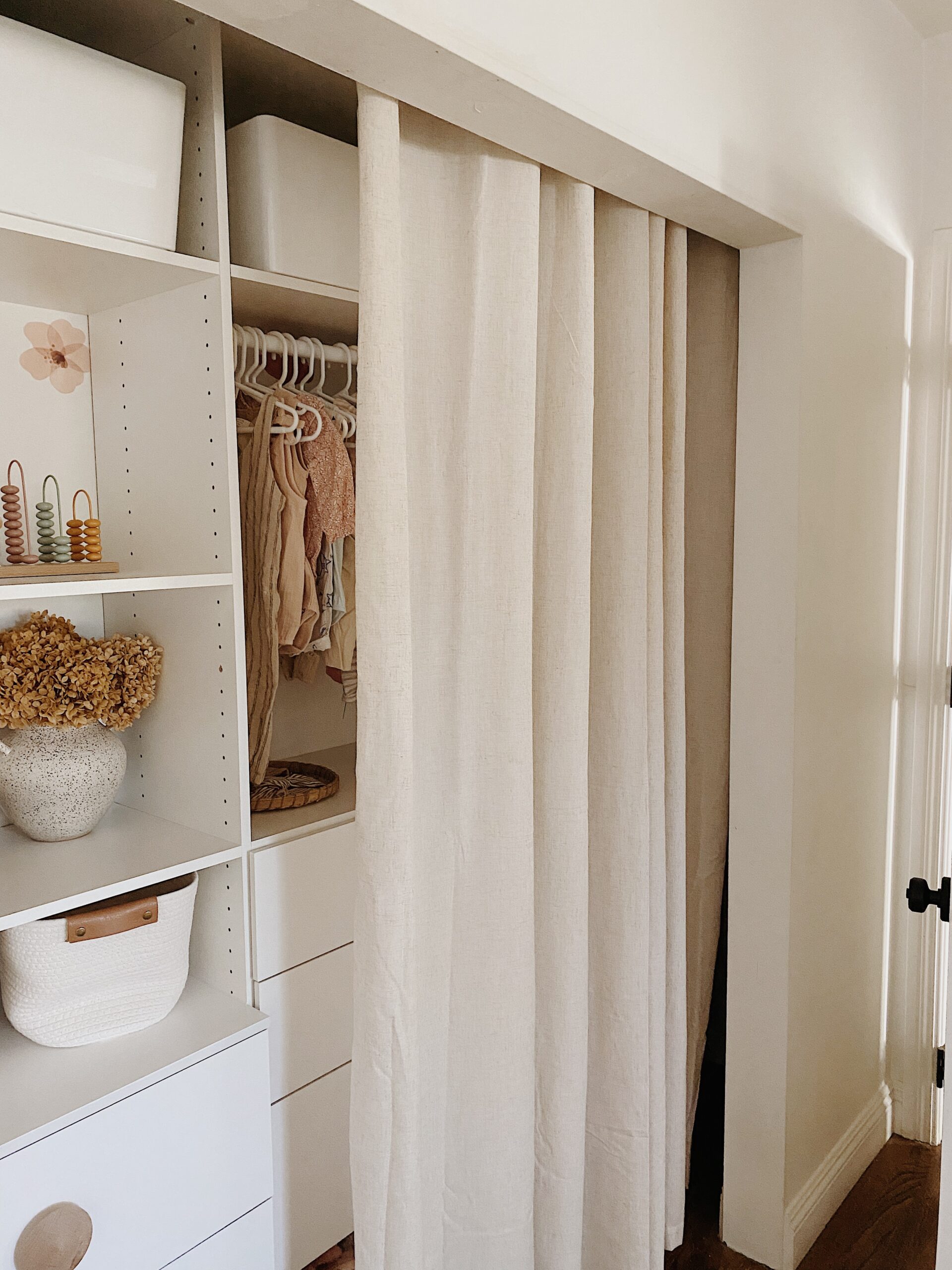 Nursery wardrobe with outlet drawers